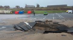 Sinkhole swallows up part of shore car park