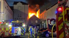 Woman taken to hospital as fire destroys salon