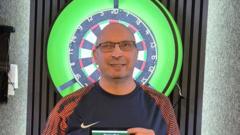 Factory to the oche: Langford, 62, set for major debut