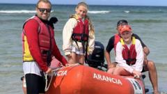Girl with leukaemia at finish line of 'aquathalon'