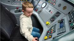 Train superfan, 5, becomes rookie driver