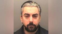 Man denies murdering Ian Watkins in prison