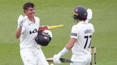 Thomas hits debut century as Surrey dominate Sussex