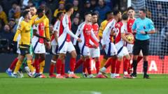 Arsenal charged over players’ reaction to red card