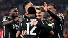 Arsenal score seven to thrash PSV in first leg