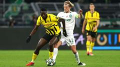 Dortmund ease past Sporting to reach last 16