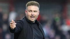 Rooney reinstalled as Larne manager