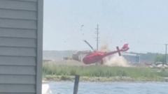 Watch: Moment helicopter flips and crash lands in Michigan