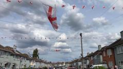 England football fans fill street with flags