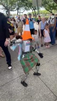 Kilted robot parties with fans in Miami