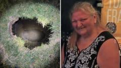 Search under way for woman believed trapped in sinkhole