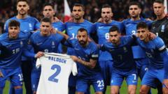 England & Greece pay tribute to Baldock at Wembley