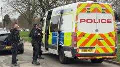 Armed police arrest man in street with samurai sword