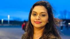Body of 'cherished' woman found between parked cars