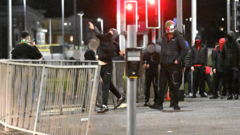 Nine officers and child injured in disorder before football match