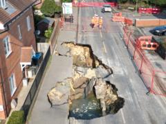 Major incident declared after large sinkhole appears outside houses