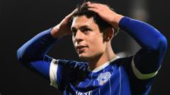 Cardiff's Salech goes from collector to sticker book star