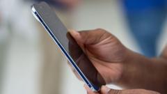 A person holding the Apple iPhone Air