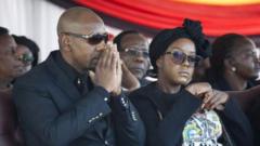 Bona Mugabe wit her husband for di funeral of her papa for 2019
