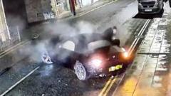 BMW spins out of control into house