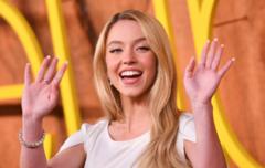 Sydney Sweeney waving at the premiere