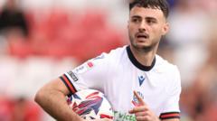 MK Dons sign Bolton striker Collins