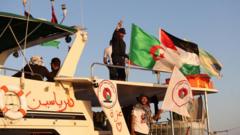 Activists say Gaza flotilla circled by Israeli warship