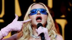 Glastonbury festival organiser dismisses rumours that Madonna will headline in 2027