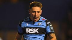 Wales wing Adams signs new Cardiff contract