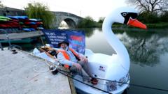 Watch: Travelling 126 miles on a swan pedalo