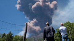 Mount Etna erupts as large plumes rise from volcano