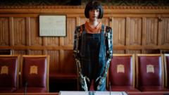 Ai-Da Robot, the world's first ultra-realistic humanoid robot artist, appears at a photo call in a committee room in the House of Lords on October 11, 2022 in London, England