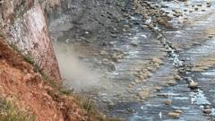Warning to beach visitors after cliff landslide