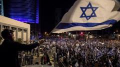One protester wave di Israeli flag during one big protest against di goment judicial overhaul plan for 11 March 2023 for Tel Aviv