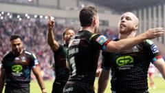 Wigan beat title rivals Hull KR to go top