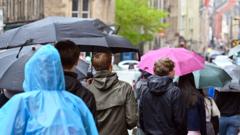 UK to turn cooler with rain after exceptional heat and dry spell