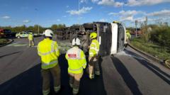 Driver rescued by fire crews after lorry overturns