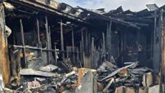 Homes of residents caught in dispute catch fire on same day