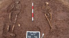 Skeletons and Anglo-Saxon homes unearthed in road dig