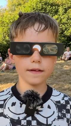 Boy, 8, enjoys historic solar eclipse