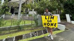 Spanish couple held in Singapore over football protest