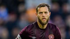 Salford sign midfielder Grant on two-year deal