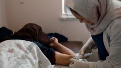 Afghan women 'banned from midwife courses' in latest blow to rights