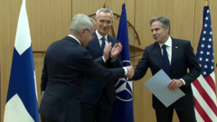 Di final act of Finland accession complete as Finland foreign minister Pekka Haavisto hand di accession document to Antony Blinken
