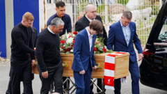 Hundreds attend ex-Liverpool manager Beard's funeral