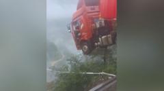 Watch: Lorry driver trapped in cabin after China bridge collapse