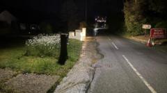Deluge from burst sewer floods drives and garages