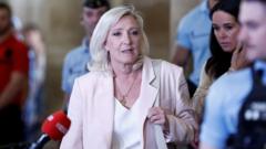 Marine Le Pen found guilty, but court clears way for presidential run if she wears tag