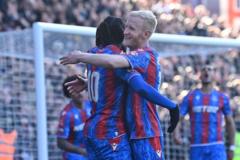 Palace cruise past 10-man Millwall to reach last eight