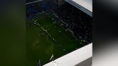 Rangers and Celtic fans invade pitch after Scottish Cup tie